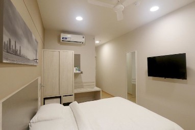 Ginger Hotel Pimpri: Habitación